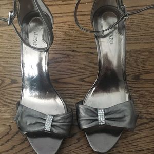 Silver stilettos with rhinestone bow